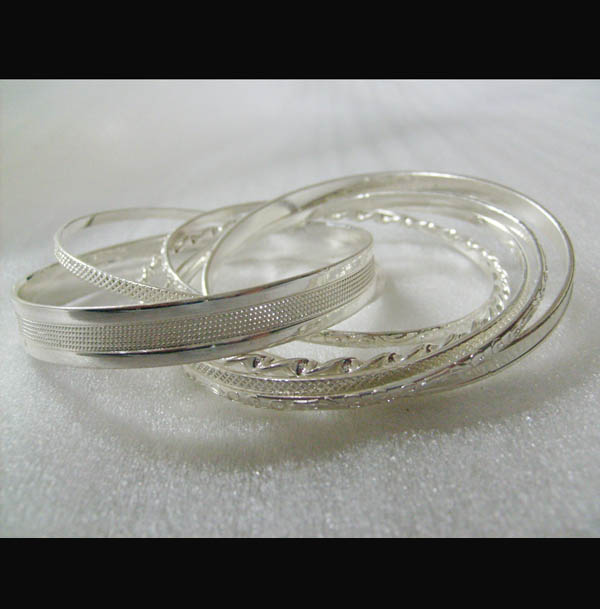 Bracelet is made of iron with shinny silver plating.